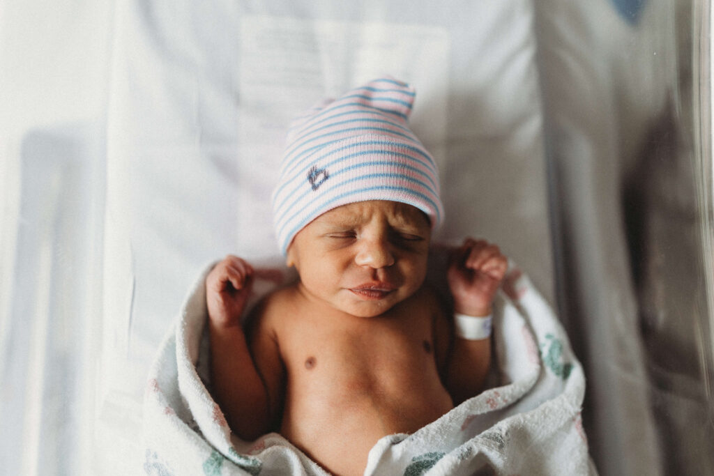 Atlanta Fresh 48 photographer capturing newborn in hospital room