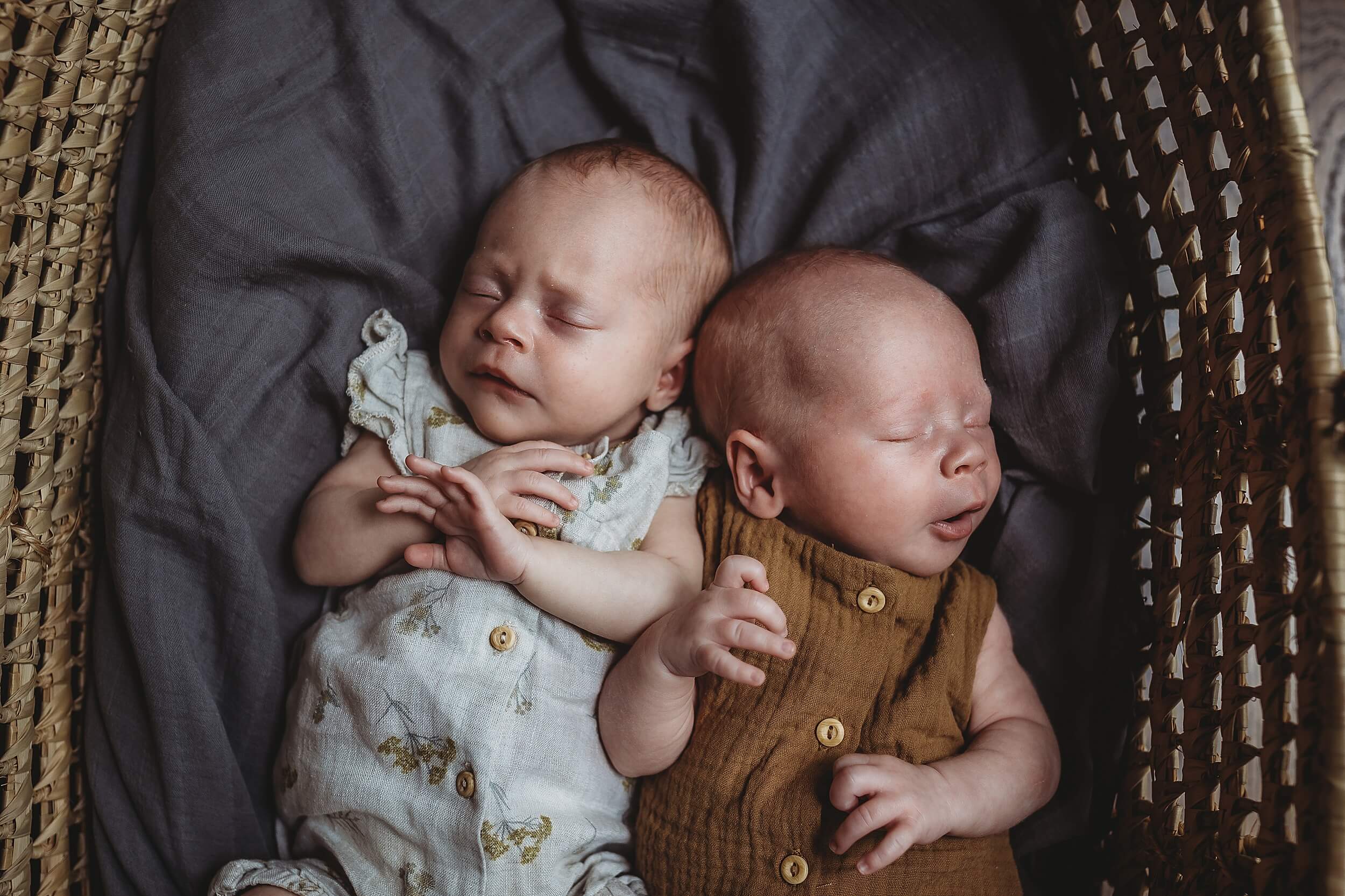 Fine art newborn photography of twins at home in Sandy Springs, GA with neutral tones