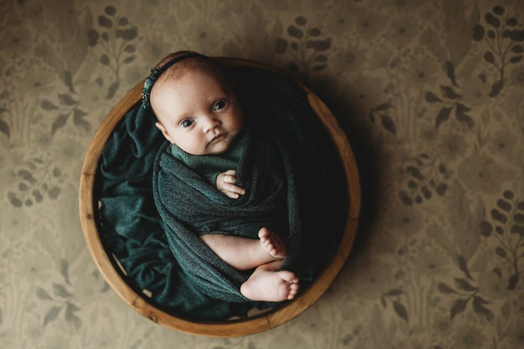 Posed newborn portrait of an awake baby photographed during an in-home newborn photography session in Atlanta.
